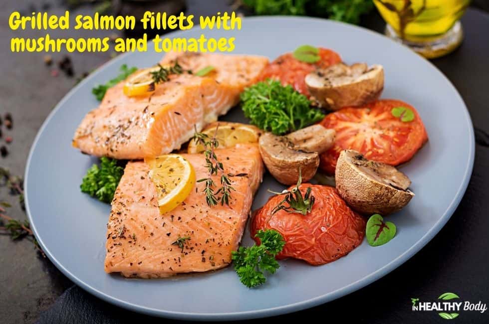 Grilled salmon fillets with mushrooms and tomatoes